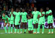 Super Falcons players react to a missed shot
