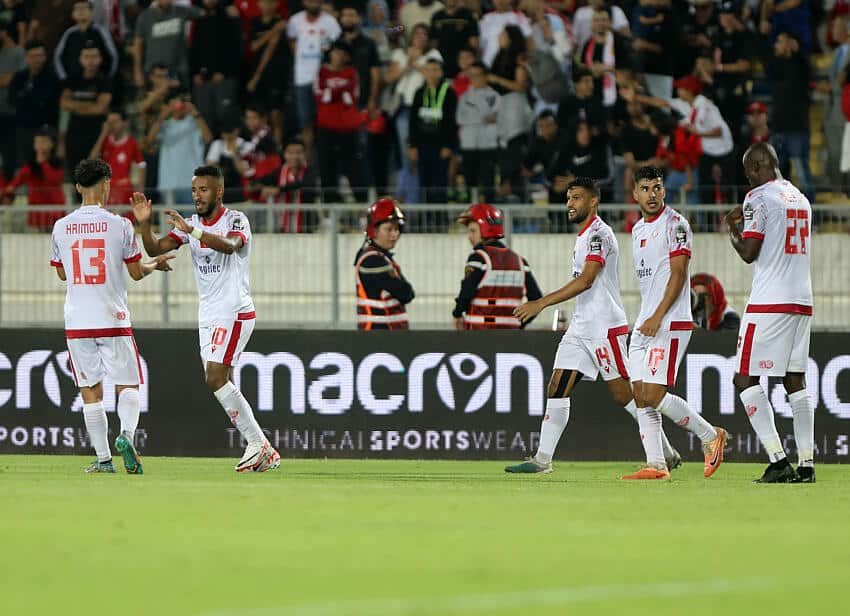 Wydad players celebrate goal in Enyimba clash