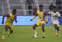 Medeama SC defender Kamaradini Mamudu (14) passes to forward Theophilus Anoba (18) during an international friendly match between DC United and Medeama SC of Ghana