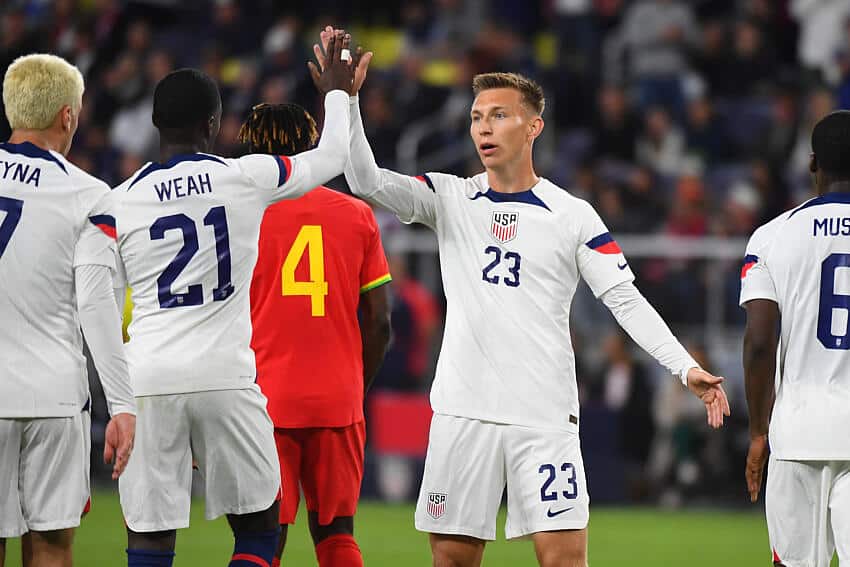 USMNT players celebrate scoring Ghana
